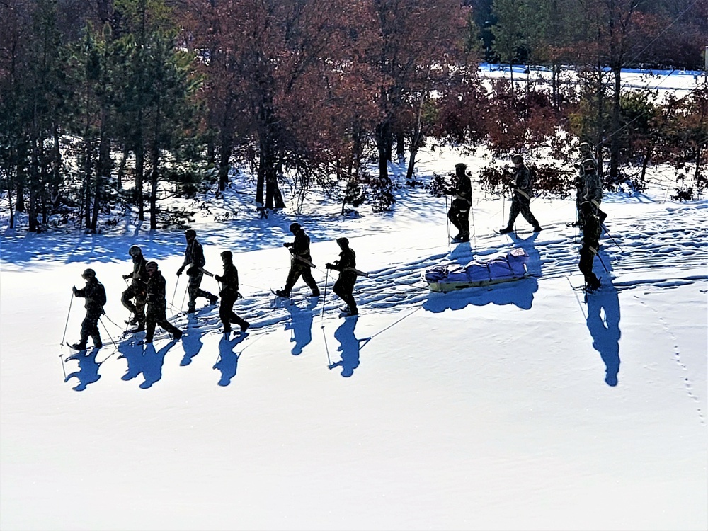 Fort McCoy Cold-Weather Operations Course Class 21-04 students conduct field training in snowshoes