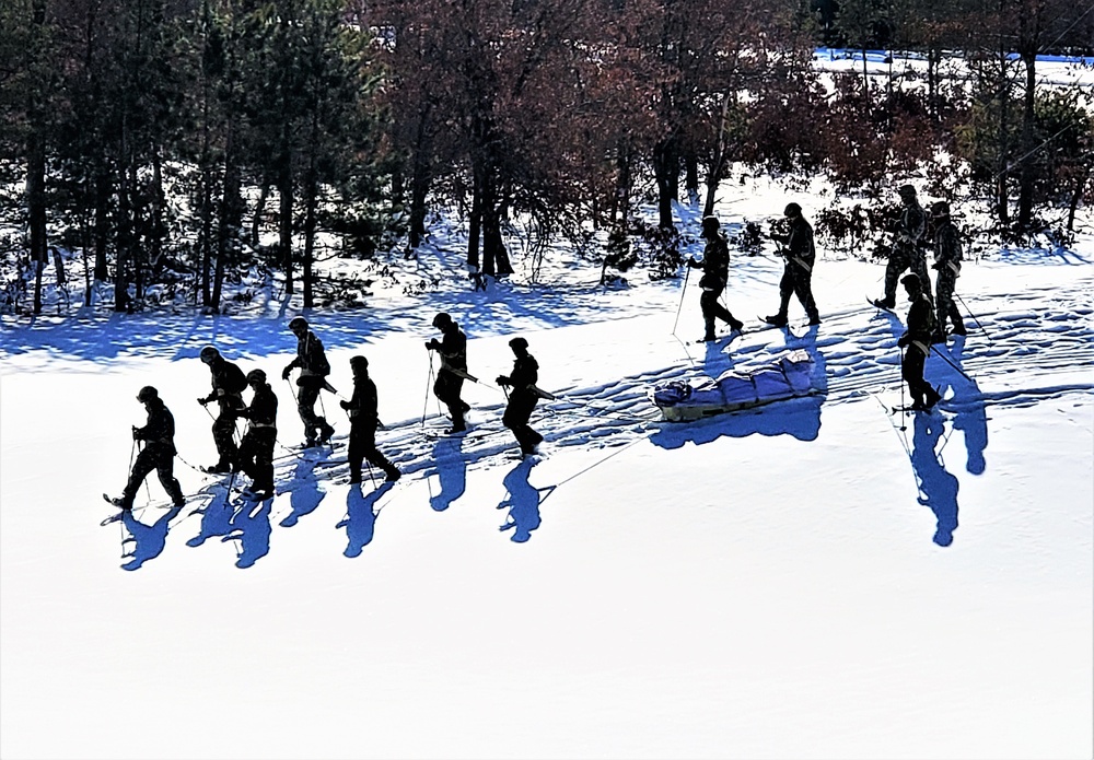 Fort McCoy Cold-Weather Operations Course Class 21-04 students conduct field training in snowshoes
