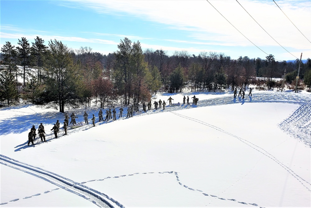 Fort McCoy Cold-Weather Operations Course Class 21-04 students conduct field training in snowshoes