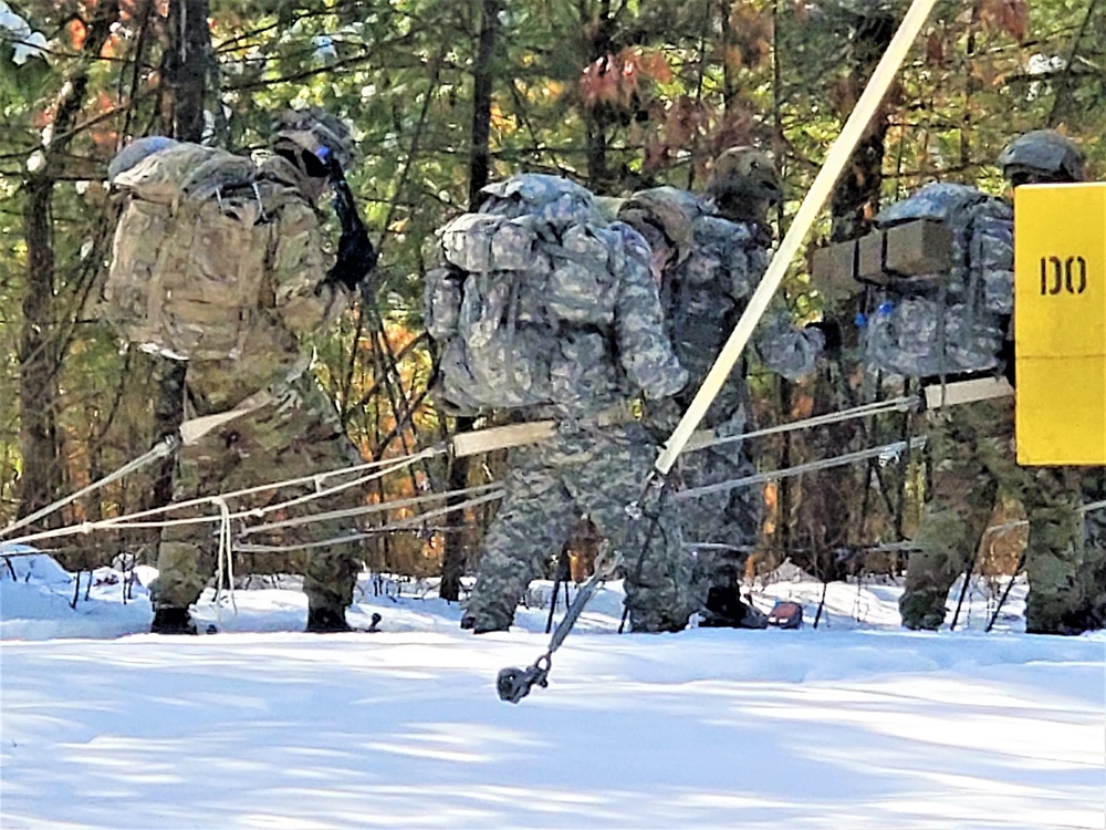 Fort McCoy Cold-Weather Operations Course Class 21-04 students conduct field training in snowshoes