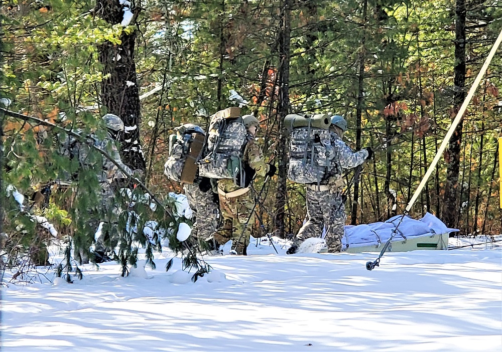 Fort McCoy Cold-Weather Operations Course Class 21-04 students conduct field training in snowshoes