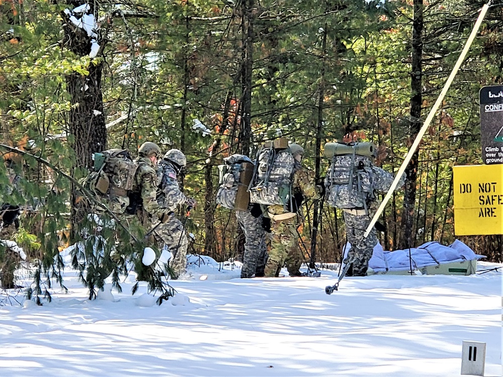 Fort McCoy Cold-Weather Operations Course Class 21-04 students conduct field training in snowshoes