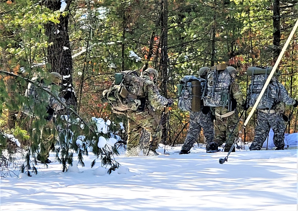 Fort McCoy Cold-Weather Operations Course Class 21-04 students conduct field training in snowshoes