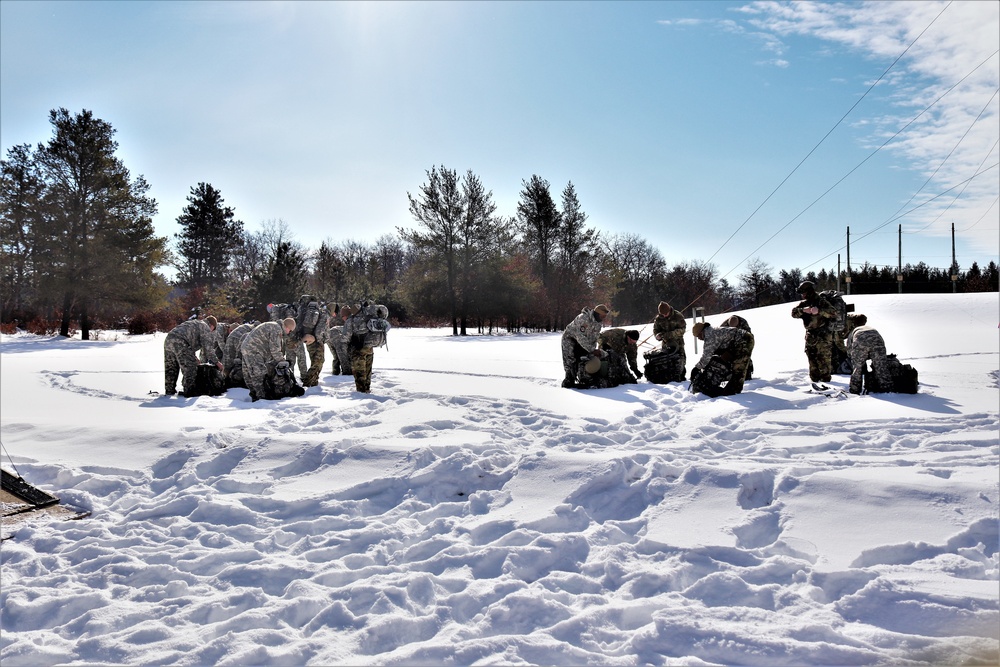 Fort McCoy Cold-Weather Operations Course Class 21-04 students conduct field training in snowshoes