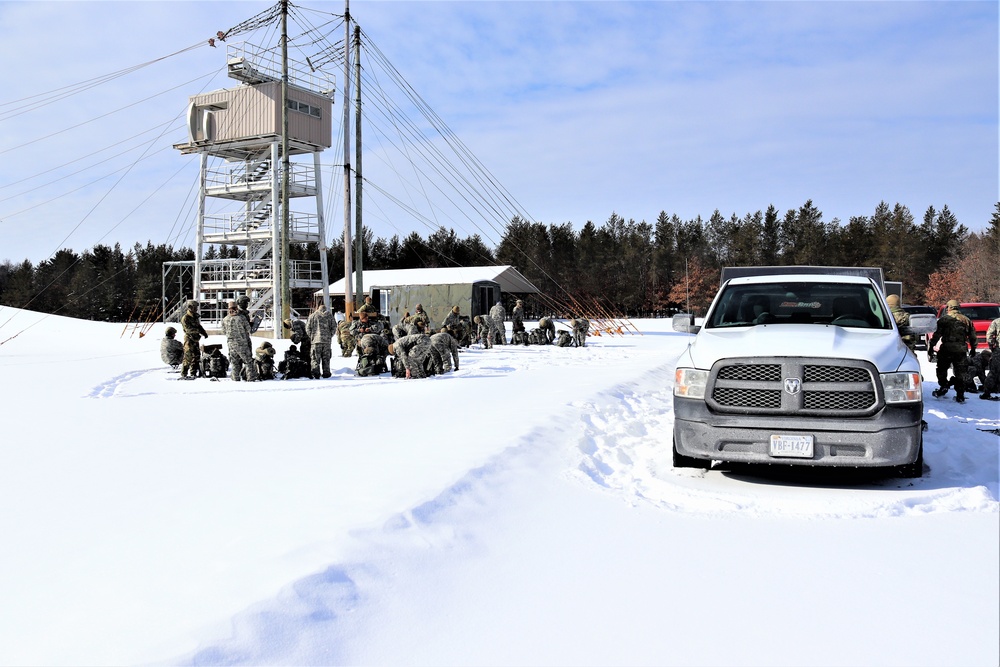 Fort McCoy Cold-Weather Operations Course Class 21-04 students conduct field training in snowshoes