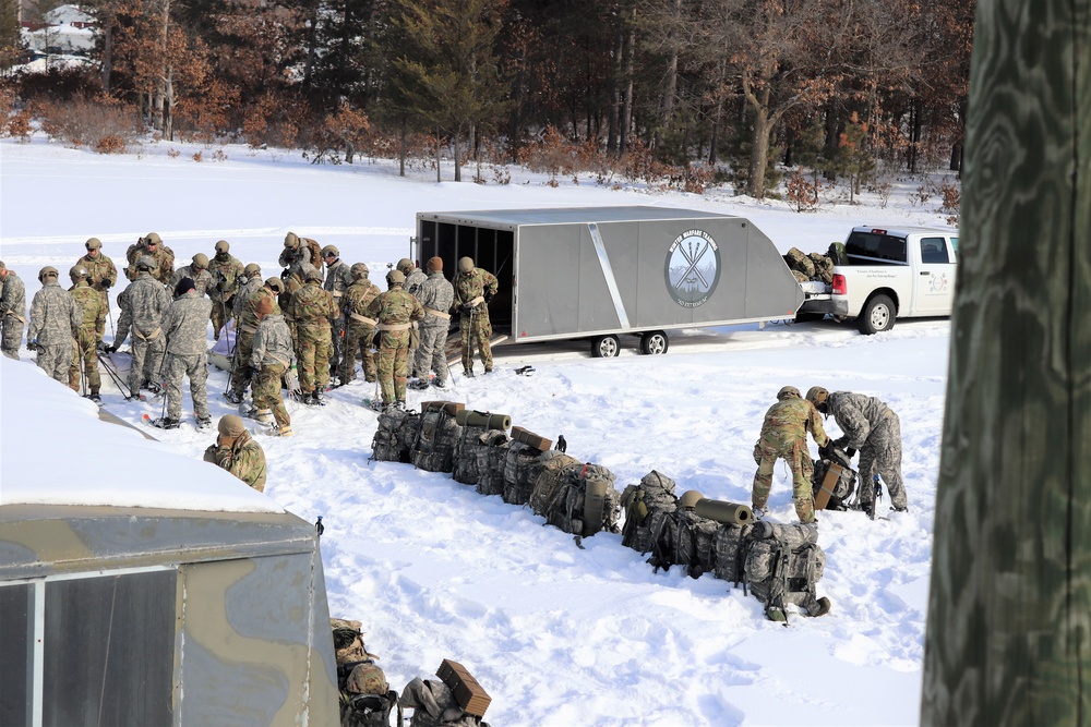 Fort McCoy Cold-Weather Operations Course Class 21-04 students conduct field training in snowshoes