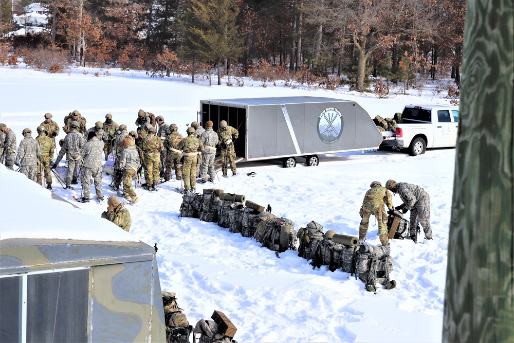 Fort McCoy Cold-Weather Operations Course Class 21-04 students conduct field training in snowshoes