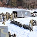 Fort McCoy Cold-Weather Operations Course Class 21-04 students conduct field training in snowshoes