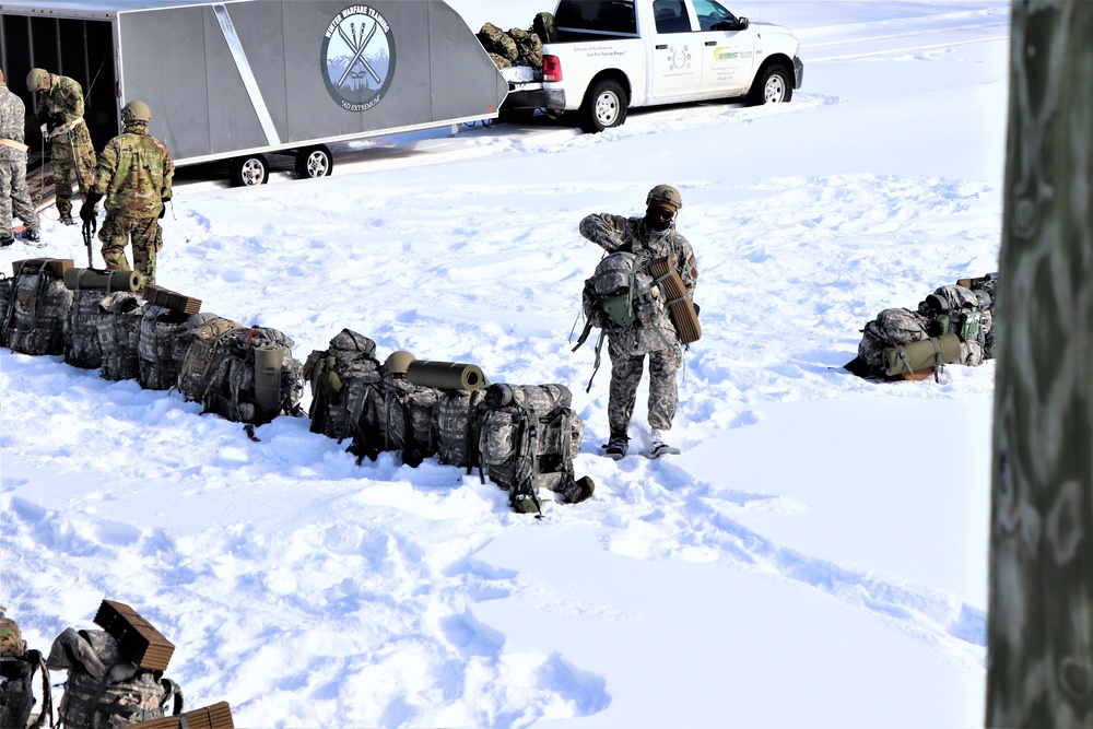 Fort McCoy Cold-Weather Operations Course Class 21-04 students conduct field training in snowshoes