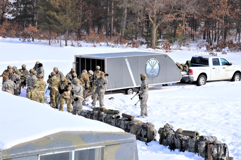 Fort McCoy Cold-Weather Operations Course Class 21-04 students conduct field training in snowshoes