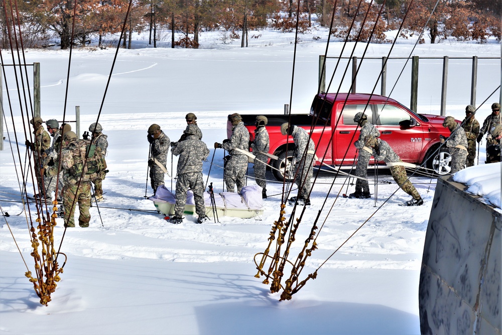Fort McCoy Cold-Weather Operations Course Class 21-04 students conduct field training in snowshoes