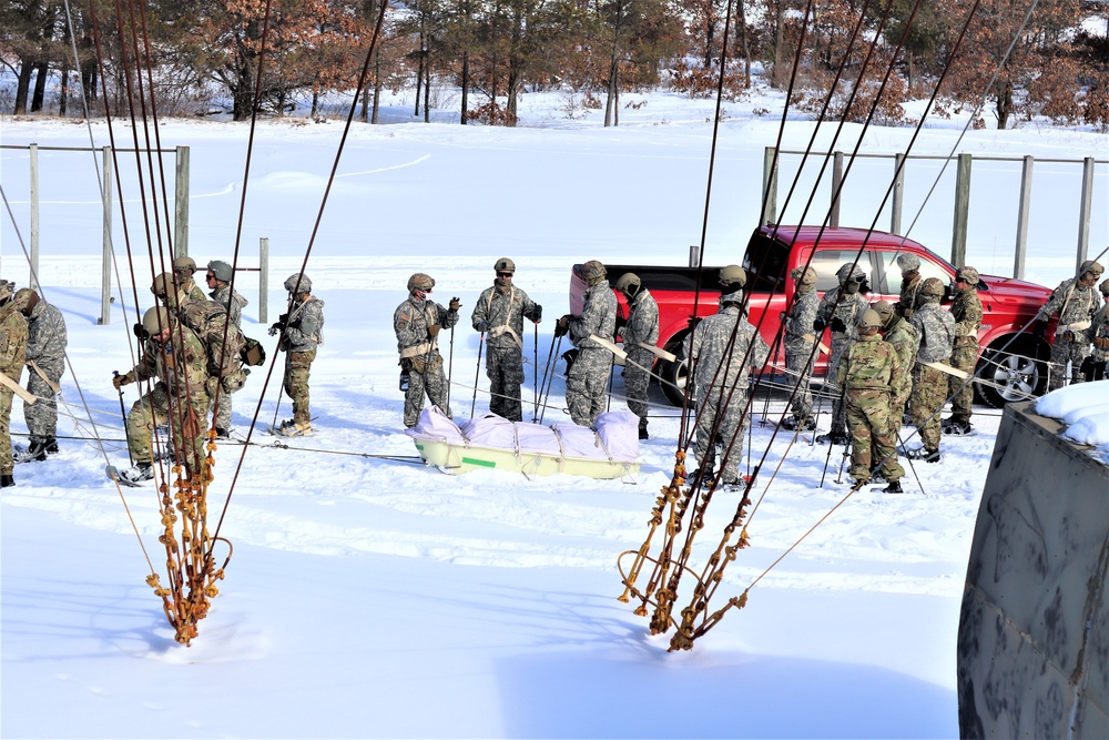 Fort McCoy Cold-Weather Operations Course Class 21-04 students conduct field training in snowshoes