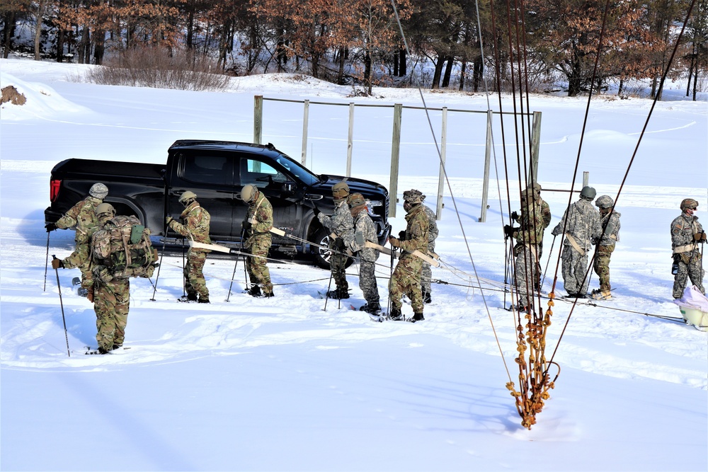 Fort McCoy Cold-Weather Operations Course Class 21-04 students conduct field training in snowshoes