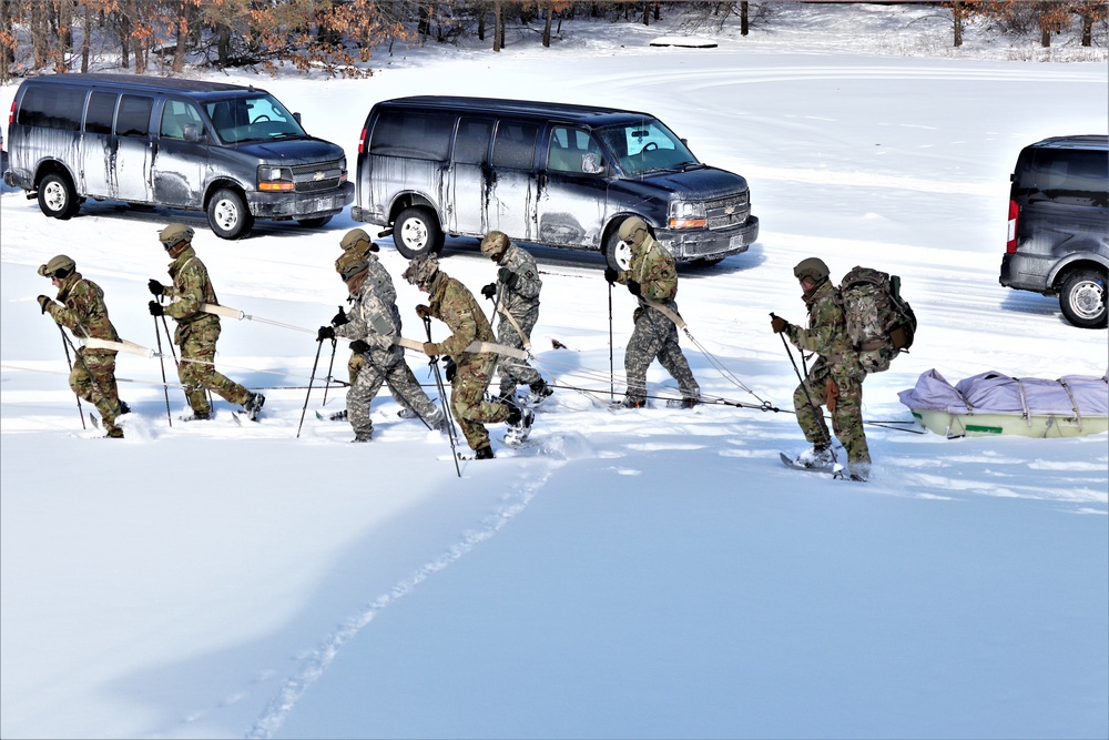 Fort McCoy Cold-Weather Operations Course Class 21-04 students conduct field training in snowshoes