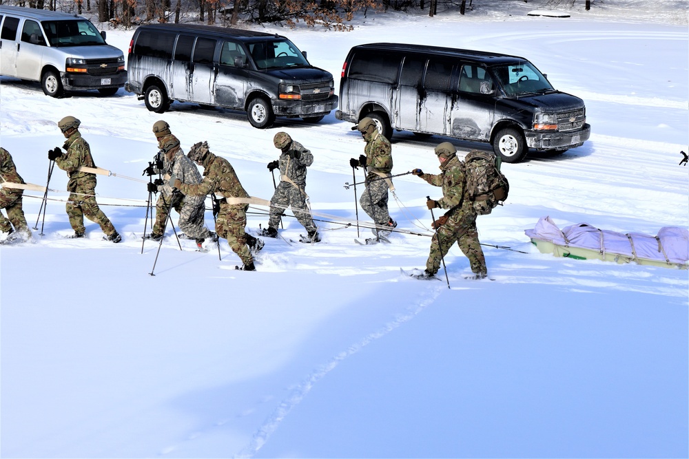 Fort McCoy Cold-Weather Operations Course Class 21-04 students conduct field training in snowshoes