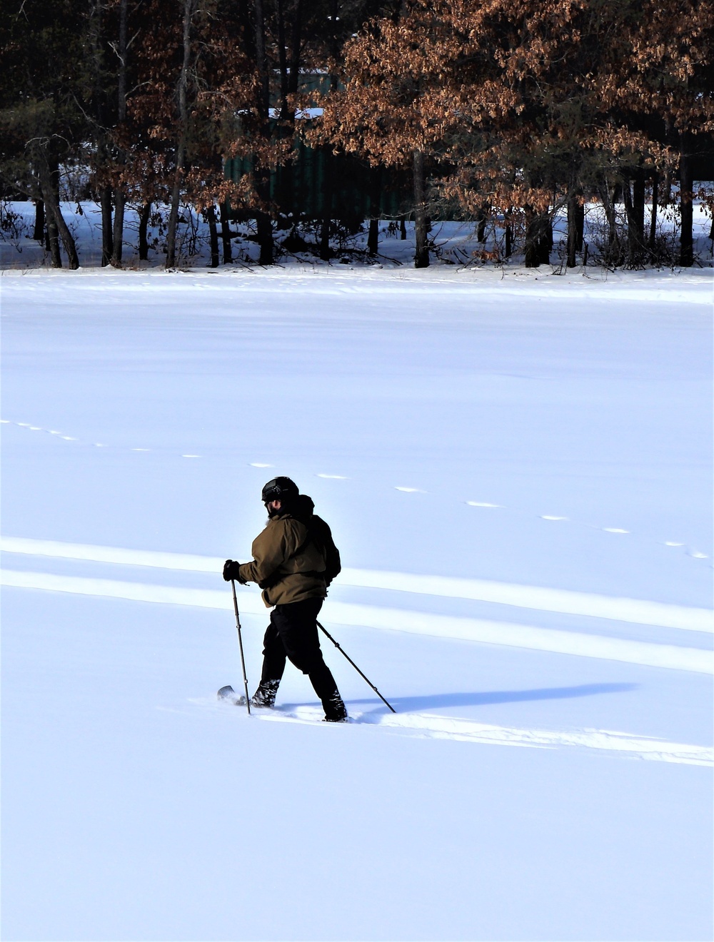 Fort McCoy Cold-Weather Operations Course Class 21-04 students conduct field training in snowshoes