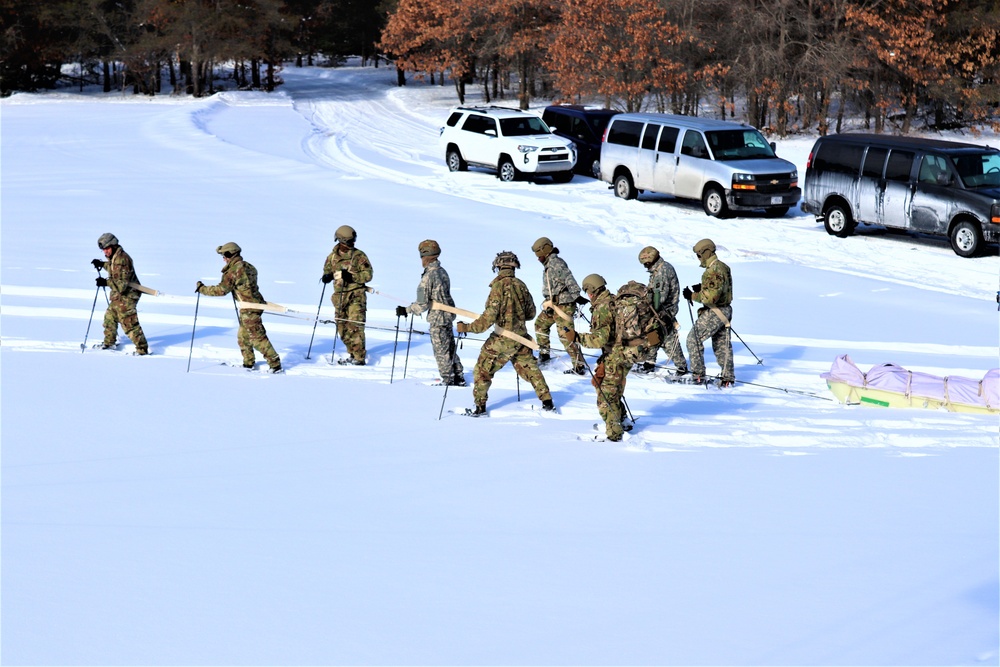 Fort McCoy Cold-Weather Operations Course Class 21-04 students conduct field training in snowshoes
