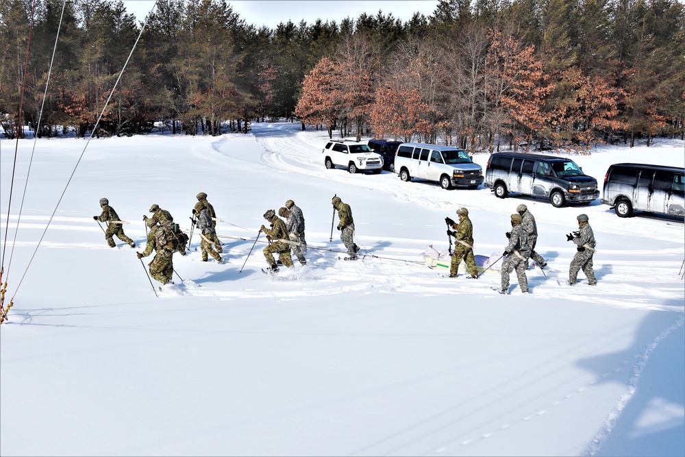 Fort McCoy Cold-Weather Operations Course Class 21-04 students conduct field training in snowshoes