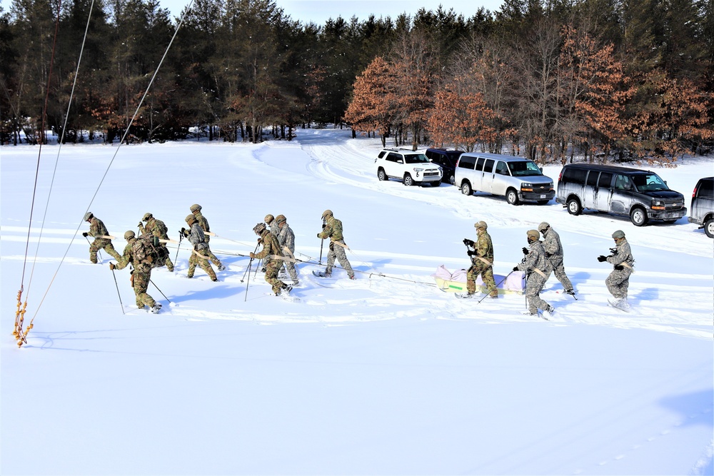 Fort McCoy Cold-Weather Operations Course Class 21-04 students conduct field training in snowshoes