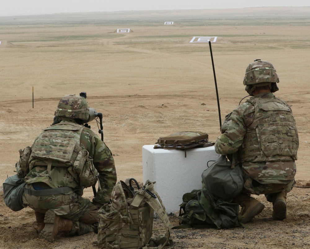 Soldiers from 1st Battalion, 35th Armored Regiment, 2nd Brigade, 1st Armored Division, provide fire support for U.S. and Kuwait Land Forces tanks