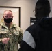 U.S. Army personnel begin in-processing for COVID Community Vaccination Center