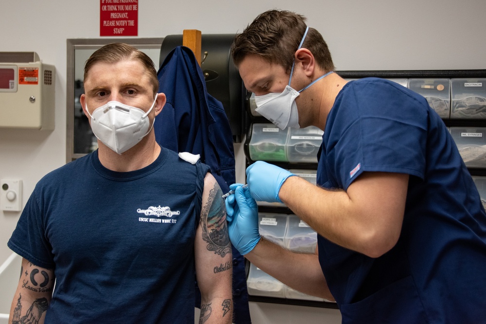 Coast Guard flies COVID-19 vaccine across the West Coast
