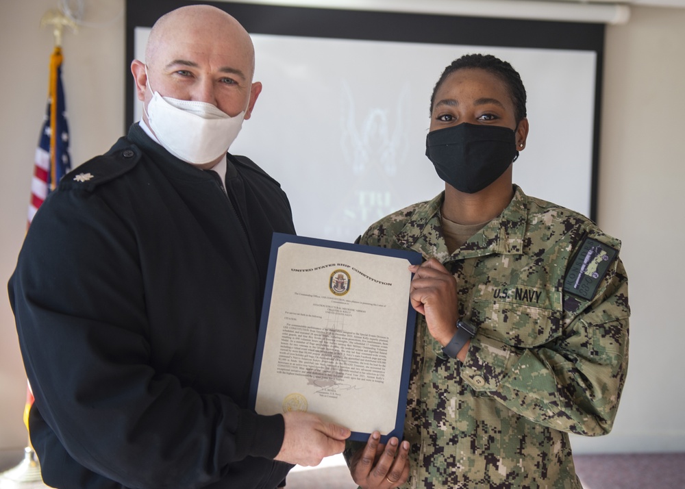 Airman Chantol Kelly assigned to USS Constitution, is awarded Blue Jacket of the Quarter