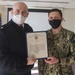 AD3 Jacob Gehret assigned to USS Constitution, is awarded Junior Sailor of the Quarter