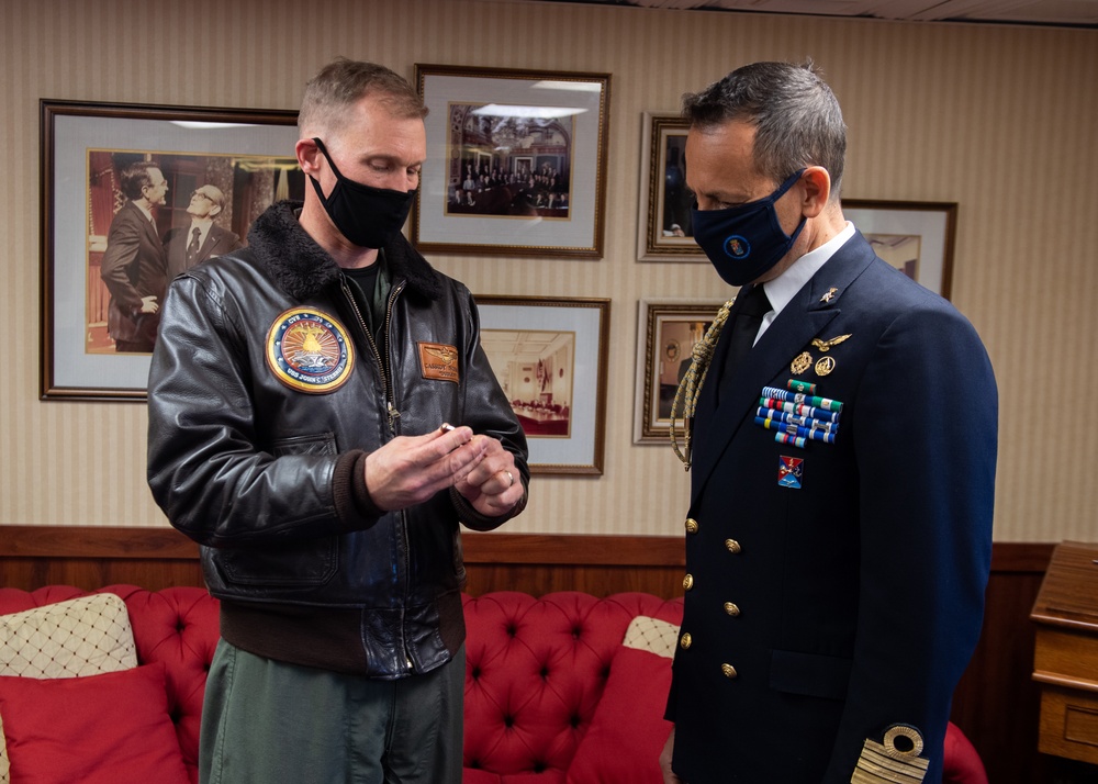 Italian Navy Capt. speaks to U.S. Navy Capt.