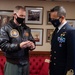 Italian Navy Capt. speaks to U.S. Navy Capt.