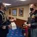 Italian Navy Capt. speaks to U.S. Navy Capt.