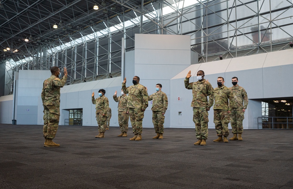 NY National Guard troops reenlistment ceremony at Javits NY Vaccination Site (24 February 2021)
