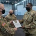 NY National Guard troops reenlistment ceremony at Javits NY Vaccination Site (24 February 2021)