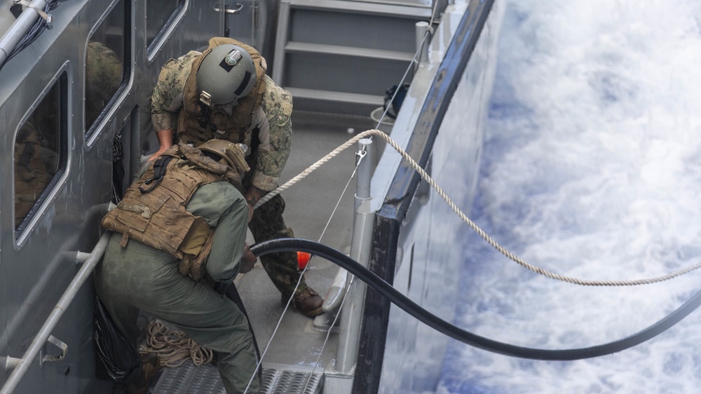 Mark VI refuels alongside USS Ashland