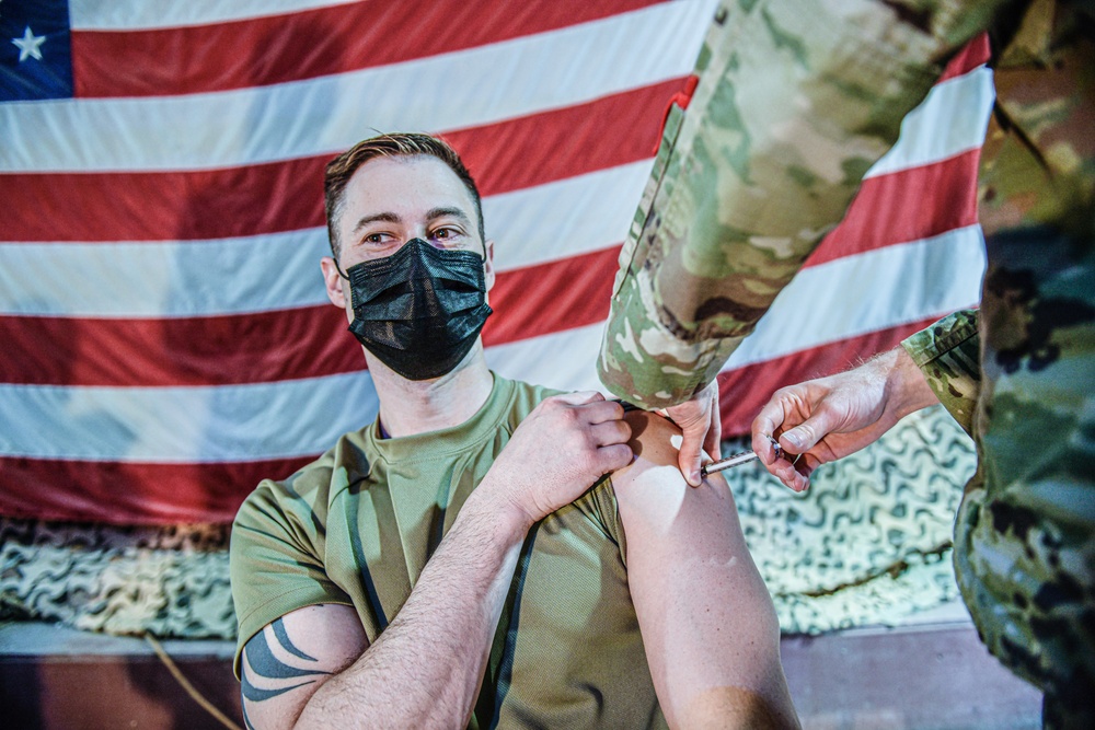 Servicemembers of the 332nd Air Expeditionary Wing Receive COVID Vaccine