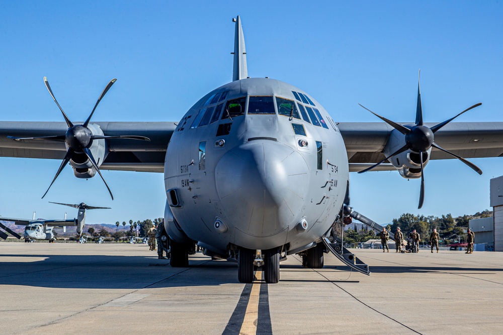 Marines, airmen work together to transport HIMARS