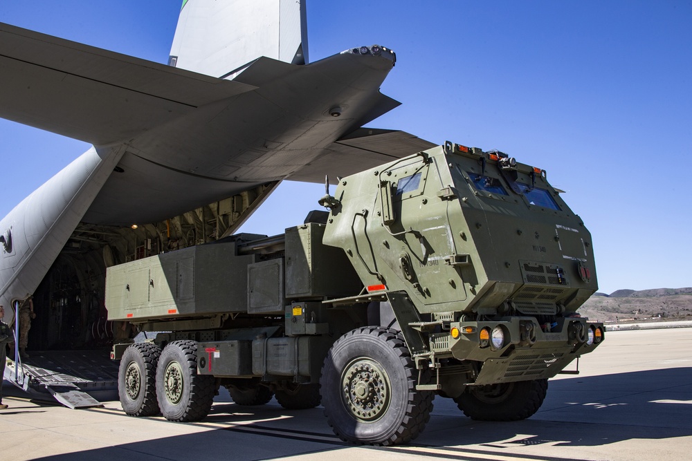 Marines, airmen work together to transport HIMARS