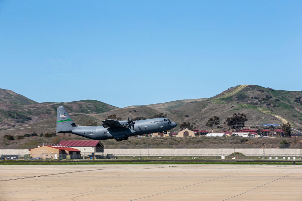 Marines, airmen work together to transport HIMARS