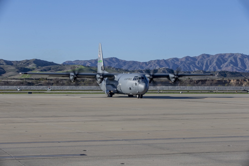 Marines, airmen work together to transport HIMARS