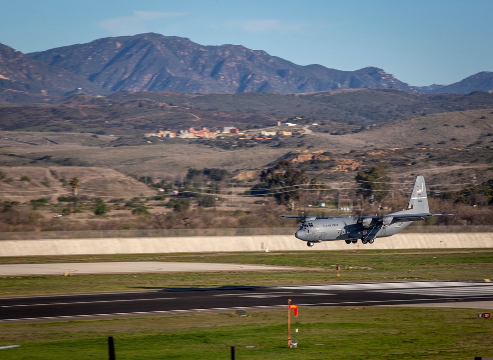 Marines, airmen work together to transport HIMARS