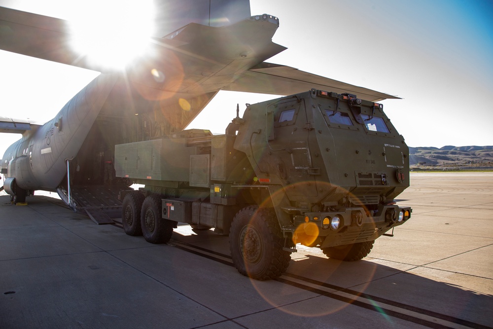 Marines, airmen work together to transport HIMARS