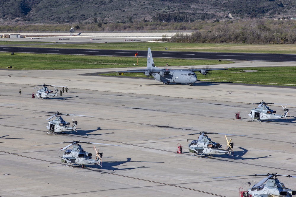 Marines, airmen work together to transport HIMARS