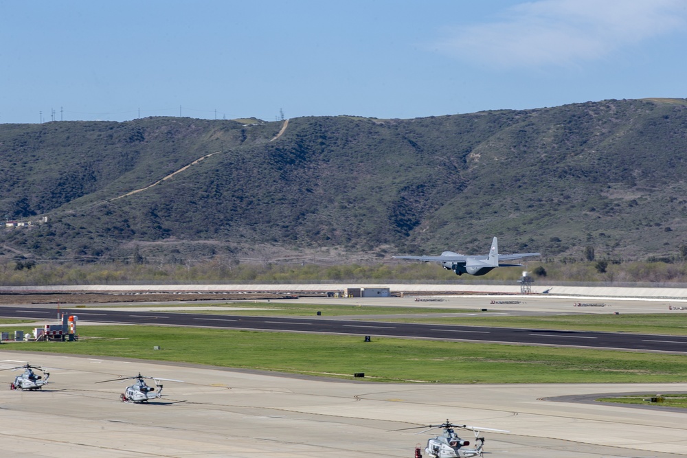 Marines, airmen work together to transport HIMARS