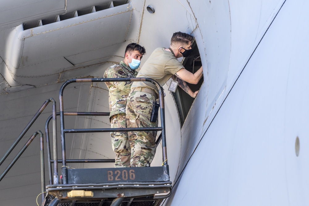 349th Aircraft Maintenance Squadron service C-5M Super Galaxy