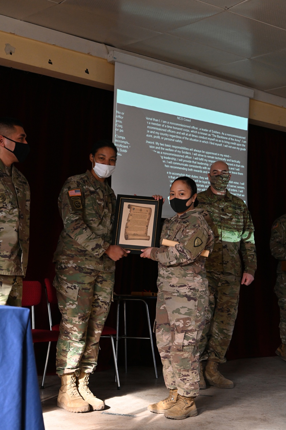 Alaska Army National Guard Sergeant Patricia Catacutan was inducted into the Non Commissioned Officer Corps while deployed to Poland.