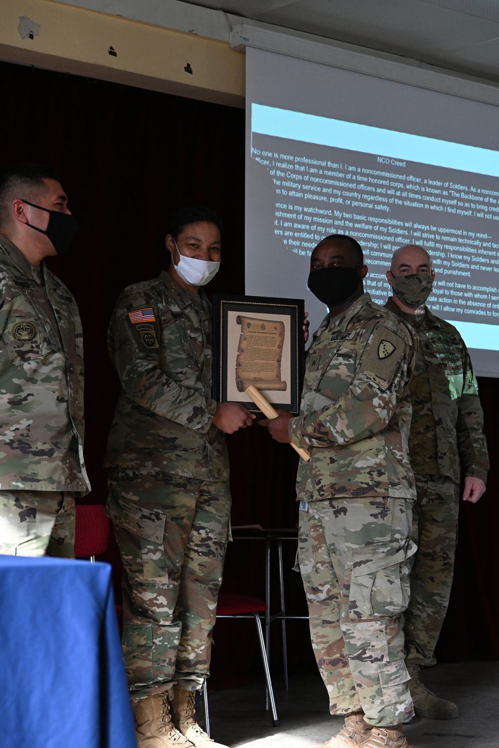 Alaska Army National Guard Sergeant Emmanuel Nfonoyim was inducted into the Non Commissioned Officer Corps while deployed to Poland.