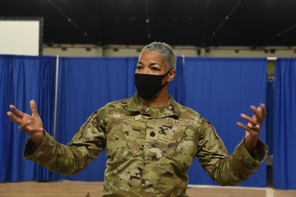U.S. Air Force Lt. Col. Countess Cooper, a chaplain with the 113th Wing, District of Columbia Air National Guard, speaks to Airmen at the D.C. Armory in Washington, D.C., Feb. 17, 2021