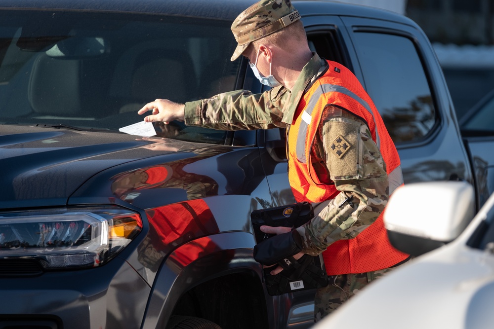 U.S. Army Medics administer COVID vaccine at Cal State LA Community Vaccination Center