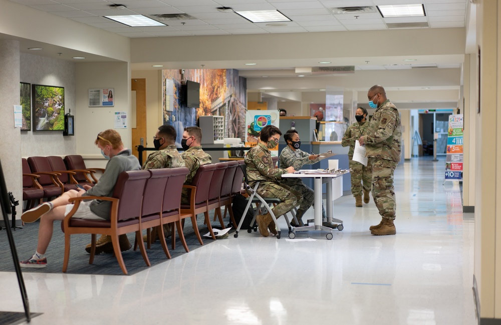 413th ASTS administers COVID-19 vaccine