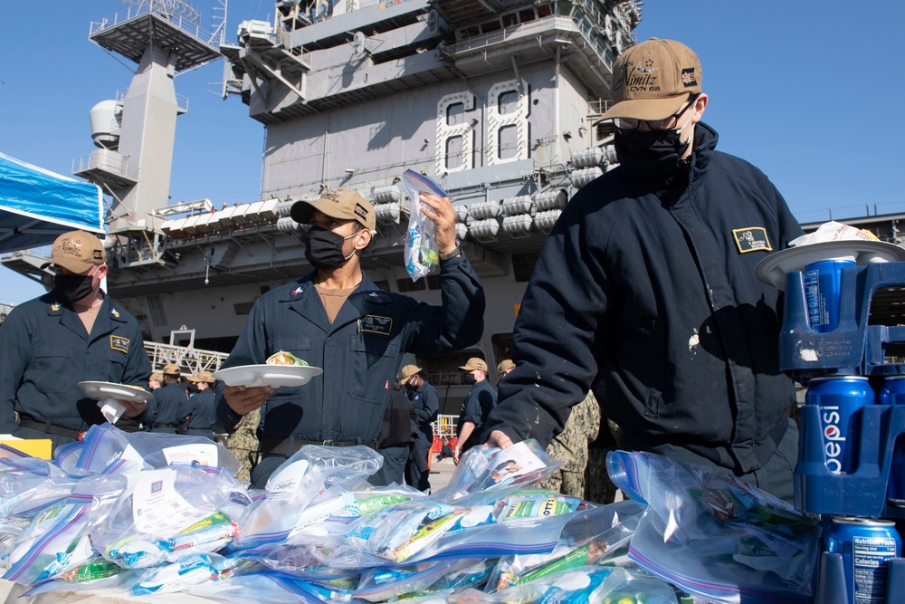 Sailors Eat Food on the Pier